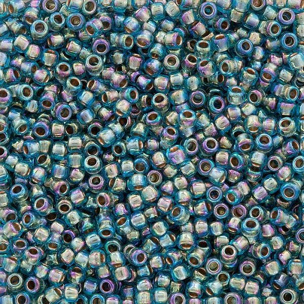 Toho Round 8/0 Gold Lined Rainbow Aqua Seed Beads 10g Toho Round 8/0 Gold Lined Rainbow Aqua Seed Beads 10g